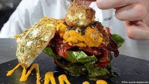 Ralph Rabara - Glamburger is burger that features bits of edible gold leaf,  lobster and caviar. One of the most expensive burgers ever created, it also  includes ingredients like black truffle, Kobe